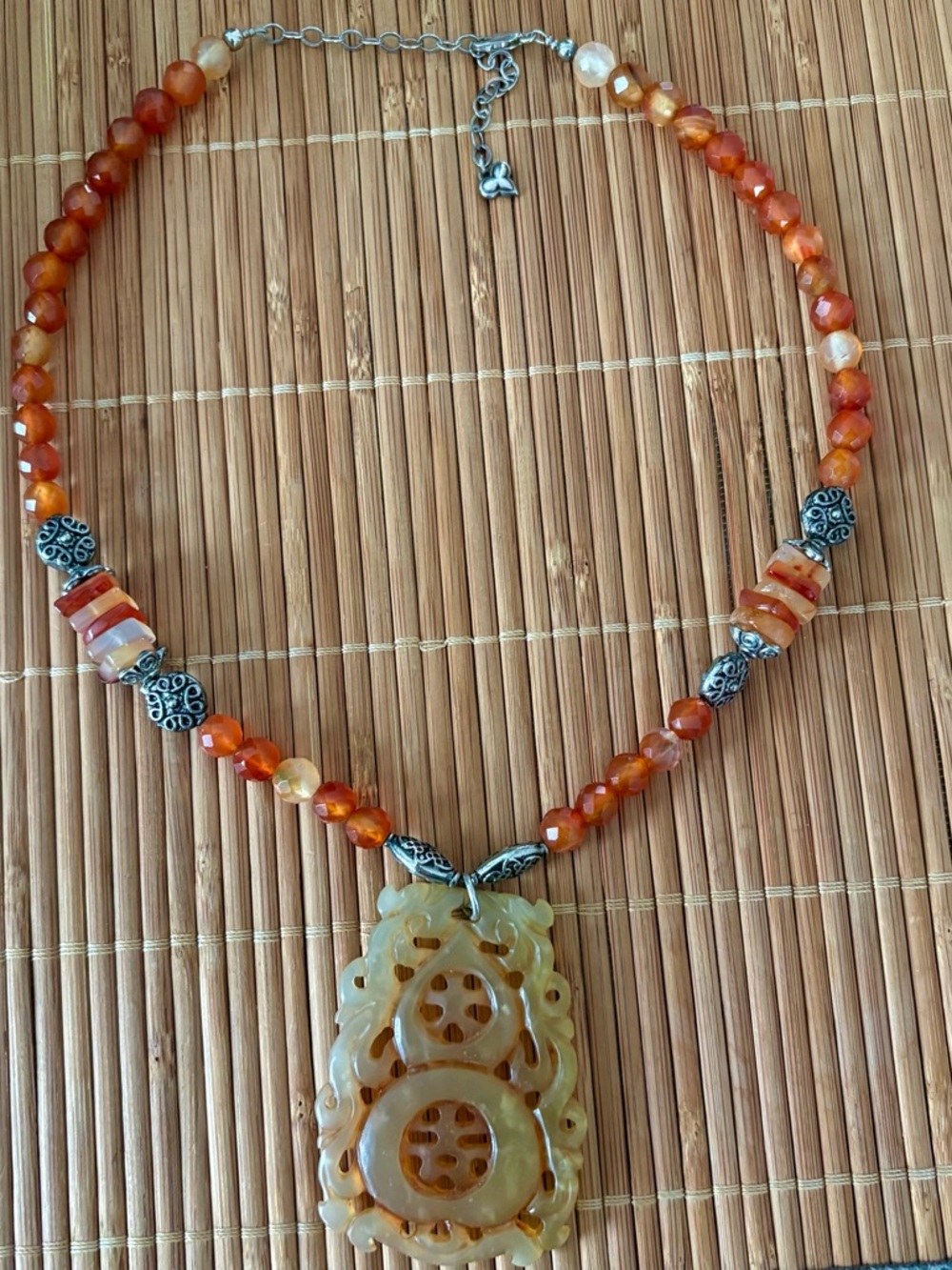 Handcrafted Faceted Carnelian Bead Necklace with Carved Jade Pendant
